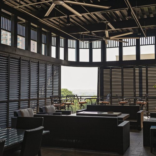 Commercial modern industrial restaurant with black shades