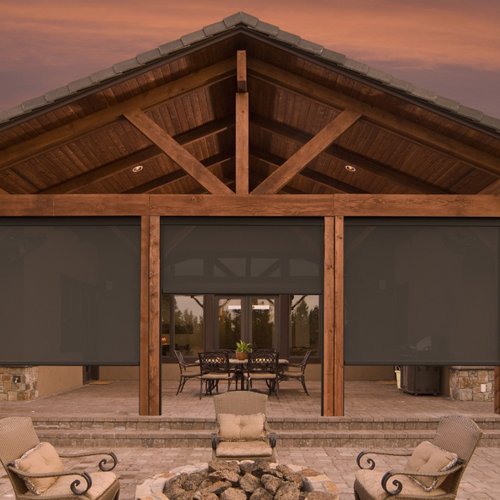 Luxury home roller shades on a patio in Houston TX