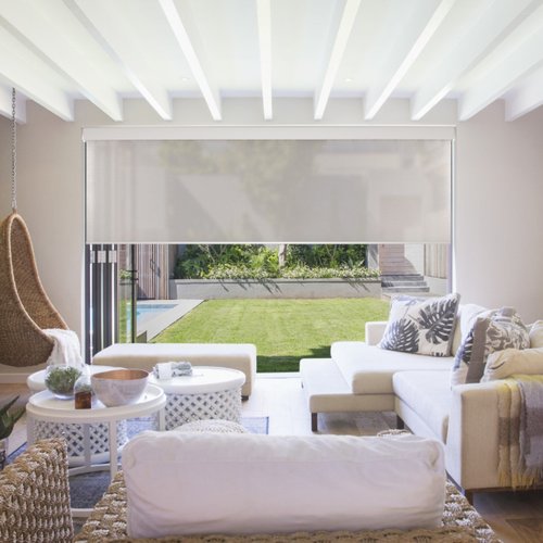 Modern home with roller shade by Royalty Window Coverings & More